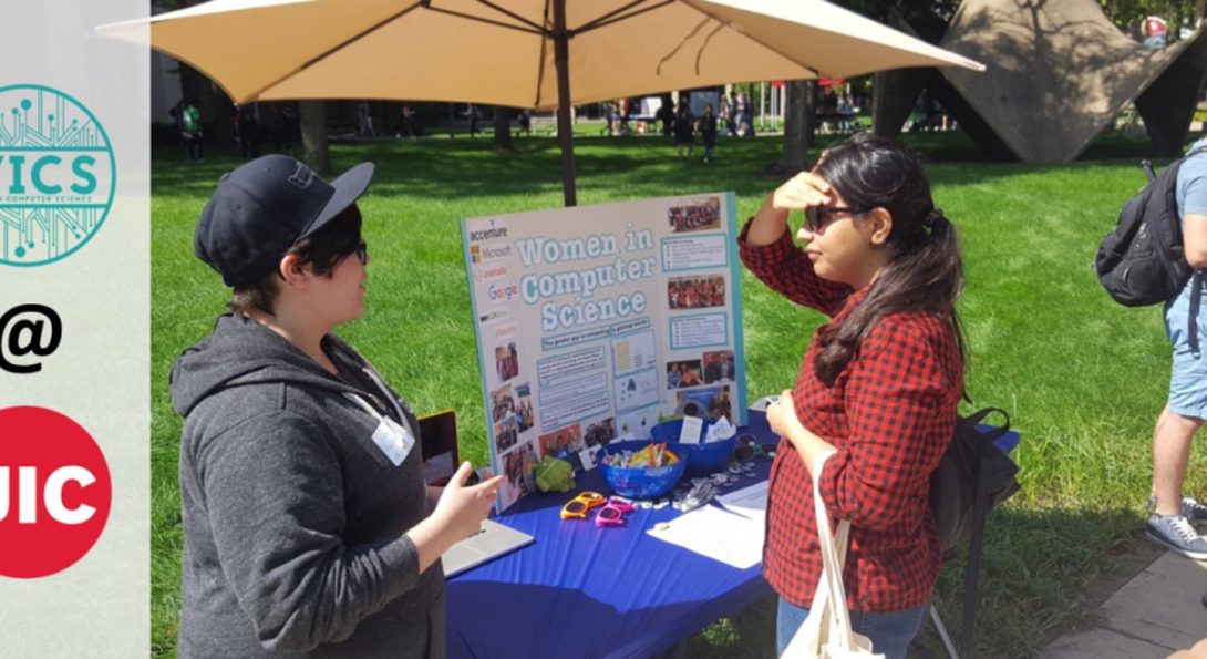 A member of UIC Women in Computer Science (WICS) speaks with an interested student during the UIC Involvement Fair on September 5th.
