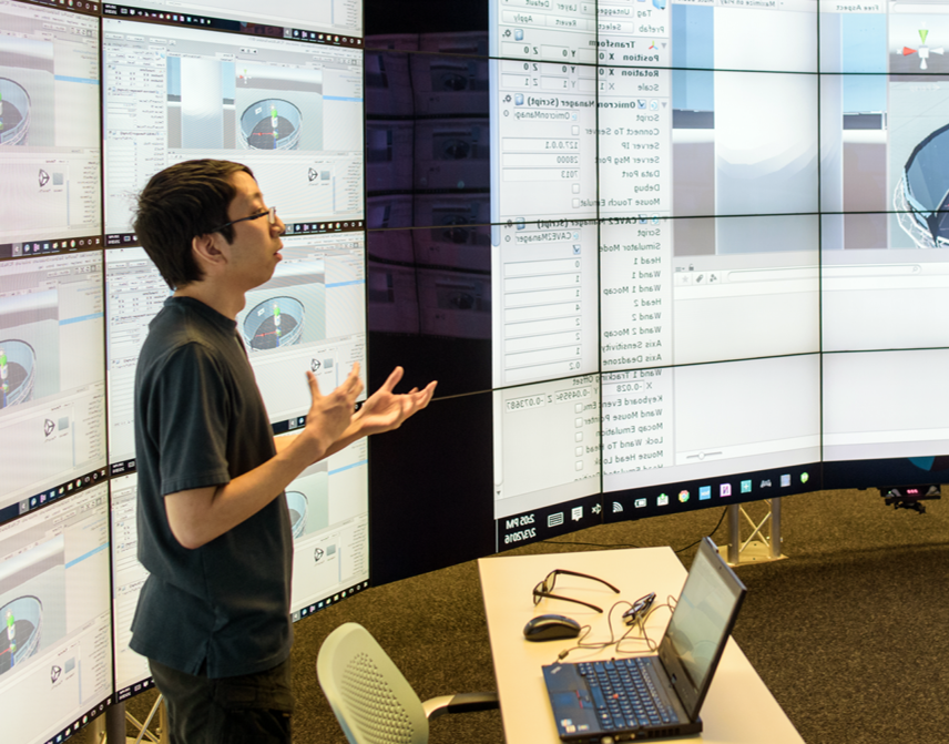 person presenting in the electronic visualization lab