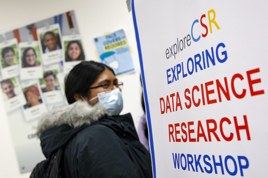 student enters data science research workshop