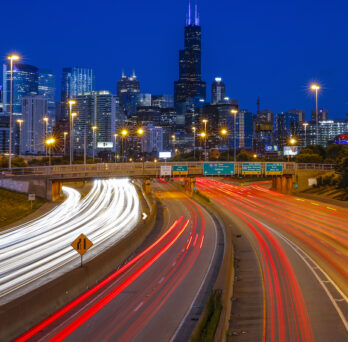 night scene of traffic lights on Chicago highway 