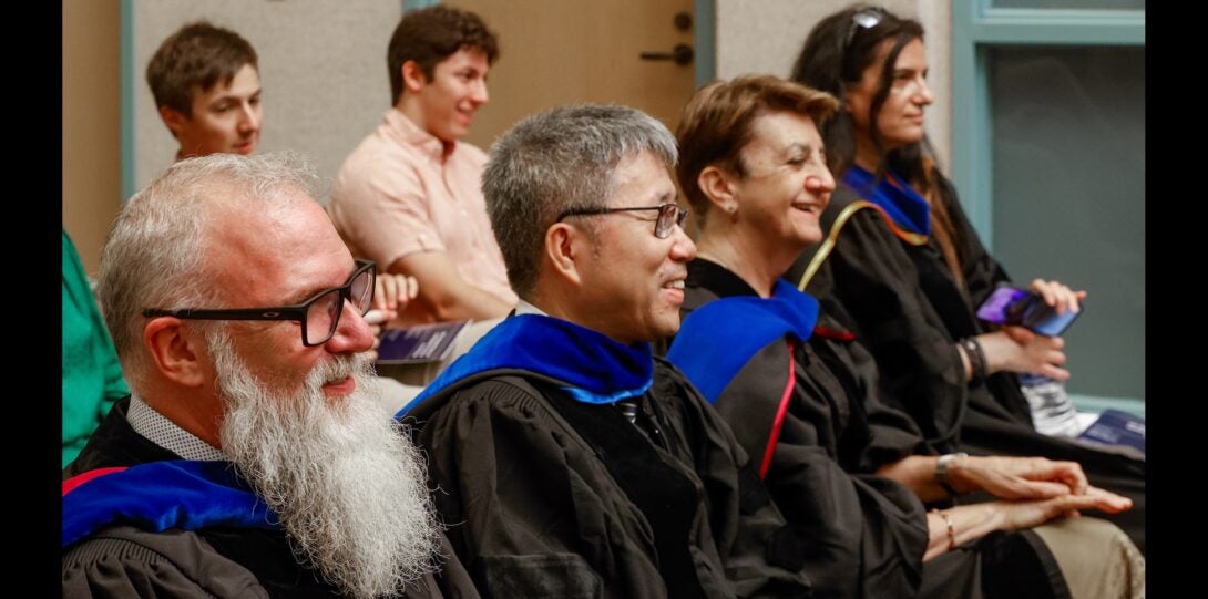 From L: Michael E. Papka, Bing Liu, Barbara Di Eugenio, and Cornelia Caragea at the investiture ceremony